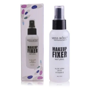 The makeup fixer setting spray shown as part of a complete beauty kit.